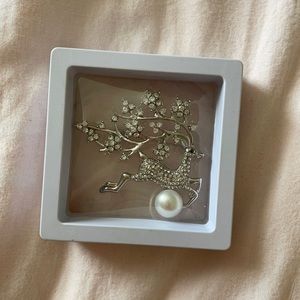 Reindeer brooch